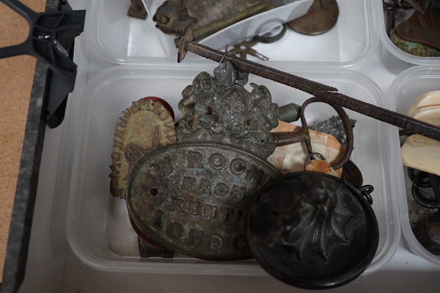 A box of 19th/20th century metal plaques, scales, ornaments etc. Condition - varies